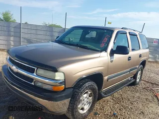 2004 Chevrolet Tahoe LT z VIN 1GNEC13Z04R130978, wystawiony jako IAAI lot #42073871 z przebiegiem 214 947 mil mil oraz . Historia ofert i sprzedaży dostępna na DreamBid. Obrazek 2.