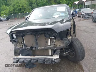2018 Toyota Tacoma SR with VIN 5TFSX5EN1JX062523, listed as a IAAI auction lot 42334816 with 56,994 mi miles and . Bid and sale history available at DreamBid. Image 12.