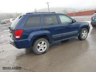 2006 Jeep Grand Cherokee Laredo with VIN 1J4GR48KX6C135070, listed as a IAAI auction lot 41966282 with 142,833 mi miles. Bid and sale history available at carsss.com. Image 4.