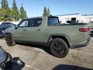 2022 Rivian R1T Launch Edition z VIN 7FCTGAAL3NN003101, wystawiony jako Copart lot #85602634 z przebiegiem 17 189 mil mil oraz Szkoda całkowita • Salvage title. Historia ofert i sprzedaży dostępna na DreamBid. Obrazek 2.