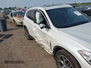 2017 BMW X1 xDrive28i with VIN WBXHT3C39H5F84338, listed as a IAAI auction lot 42400168 with 48,673 mi miles and . Bid and sale history available at DreamBid. Image 6.