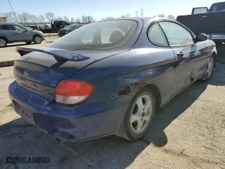 2001 Hyundai Tiburon with VIN KMHJG25F11U261457, listed as a Copart auction lot 43012635 with 165,625 mi miles and Salvage Title. Bid and sale history available at carsss.com. Image 3.