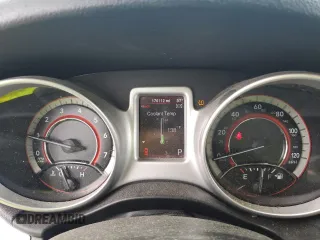 2013 Dodge Journey SXT with VIN 3C4PDCBG0DT619382, listed as a Copart auction lot 56565205 with 176,112 mi miles and Salvage title. Bid and sale history available at DreamBid. Image 9.