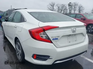 2020 Honda Civic LX with VIN 2HGFC2F66LH510069, listed as a IAAI auction lot 41860480 with 43,639 mi miles and . Bid and sale history available at DreamBid. Image 3.