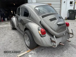 1971 Volkswagen Beetle with VIN 1112225516, listed as a Copart auction lot 64374845 with 84,201 mi miles and Salvage title. Bid and sale history available at DreamBid. Image 3.