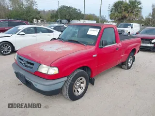 2002 Mazda B-Series 2WD Truck SX with VIN 4F4YR12D62TM23429, listed as a IAAI auction lot 41646076 with 97,360 mi miles. Bid and sale history available at carsss.com. Image 2.