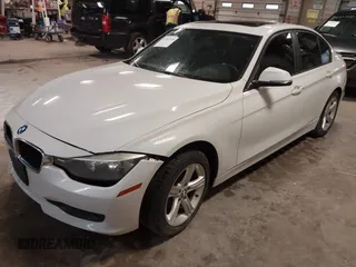 2014 BMW 3 Series 320i xDrive with VIN WBA3C3C52EPV90601, listed as a IAAI auction lot 42082100 with 1 mi miles. Bid and sale history available at carsss.com. Image 2.