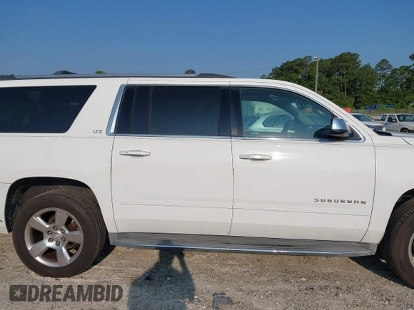 2016 Chevrolet Suburban LTZ with VIN 1GNSCJKC9GR236530, listed as a IAAI auction lot 42387868 with 185,159 mi miles and . Bid and sale history available at DreamBid. Image 13.