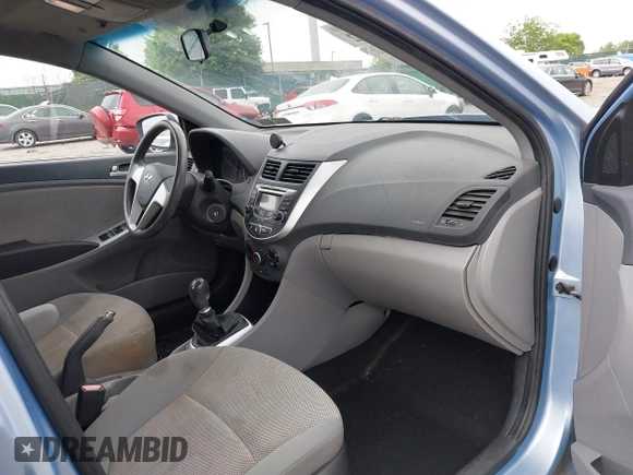 2012 Hyundai Accent GS with VIN KMHCT5AE4CU057239, listed as a IAAI auction lot 42267212 with 99,446 mi miles and . Bid and sale history available at DreamBid. Image 5.