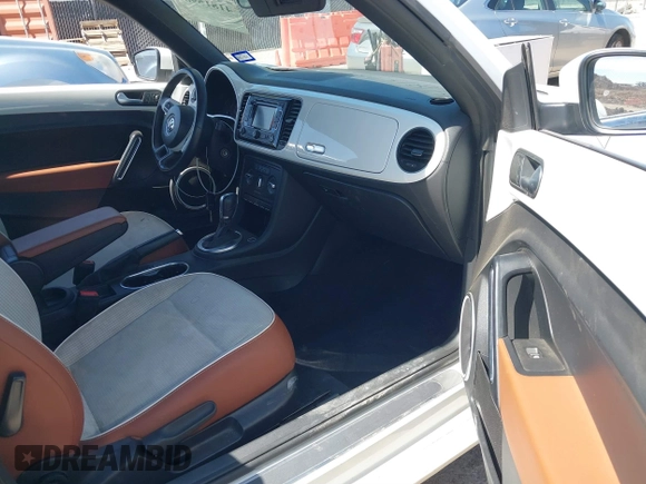 2015 Volkswagen Beetle 1.8T w/Tech with VIN 3VW517AT9FM810122, listed as a IAAI auction lot 41815980 with 72,420 mi miles and . Bid and sale history available at DreamBid. Image 5.