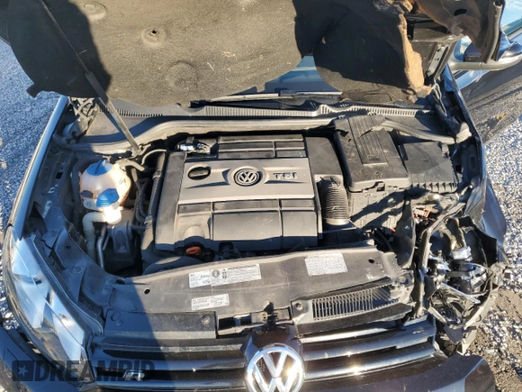 2012 Volkswagen Golf w/Sunroof & Navi z VIN WVWRF7AJ5CW282434, wystawiony jako Copart lot #79504164 z przebiegiem 115 759 mil mil oraz Szkoda całkowita • Salvage title. Historia ofert i sprzedaży dostępna na DreamBid. Obrazek 11.