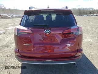2018 Toyota RAV4 XLE with VIN 2T3RFREVXJW715931, listed as a Copart auction lot 48130715 with 106,324 mi miles and Salvage Title. Bid and sale history available at DreamBid. Image 6.