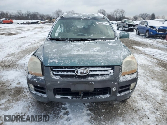 2005 Kia Sportage LX with VIN KNDJF723X57125430, listed as a Copart auction lot 86552714 with Not Provided miles and Salvage Title. Bid and sale history available at carsss.com. Image 5.