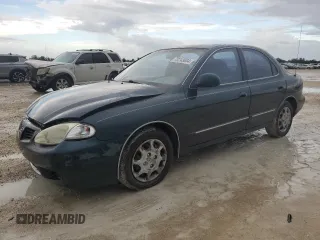 2000 Hyundai Elantra GLS z VIN KMHJF35F3YU002102, wystawiony jako Copart lot #73243004 z przebiegiem 79 155 mil mil oraz Szkoda całkowita • Salvage title. Historia ofert i sprzedaży dostępna na DreamBid. Obrazek 1.