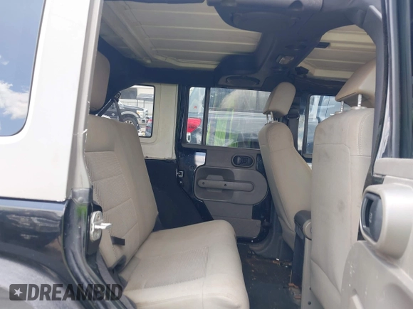 2008 Jeep Wrangler Unlimited Sahara with VIN 1J4GB59198L619802, listed as a IAAI auction lot 42361793 with 272,295 mi miles and . Bid and sale history available at DreamBid. Image 8.