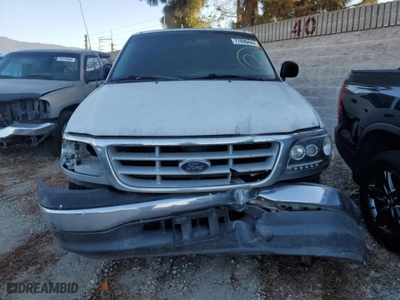 1999 Ford F-150 Work Series with VIN 1FTZF1722XKA39223, listed as a Copart auction lot 77898444 with 0 mi miles and Salvage Title. Bid and sale history available at carsss.com. Image 5.