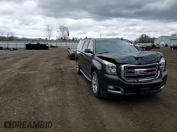 2016 GMC Yukon XL SLT with VIN 1GKS2GKC3GR282521, listed as a Copart auction lot 53453175 with 102,250 mi miles and Salvage Title. Bid and sale history available at carsss.com. Image 12.
