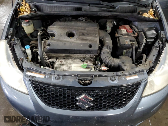 2009 Suzuki SX4 Man FWD with VIN JS2YC412496200218, listed as a Copart auction lot 46938825 with 63,909 mi miles and Salvage Title. Bid and sale history available at carsss.com. Image 11.