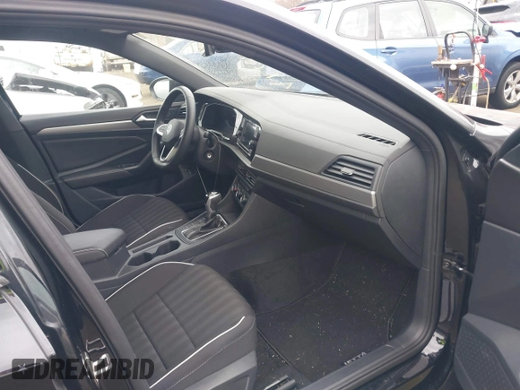2024 Volkswagen Jetta Sport with VIN 3VWBM7BU9RM027744, listed as a IAAI auction lot 41688894 with 32,834 mi miles and . Bid and sale history available at DreamBid. Image 5.
