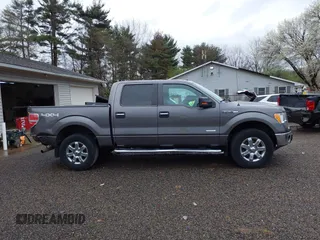 2014 Ford F-150 XL with VIN 1FTFW1ET8EFB75196, listed as a IAAI auction lot 41945260 with 319,194 mi miles. Bid and sale history available at carsss.com. Image 13.