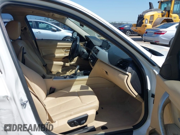 2012 BMW 3 Series 328i with VIN WBA3A5C51CF349987, listed as a IAAI auction lot 42013599 with 256,461 mi miles. Bid and sale history available at carsss.com. Image 5.