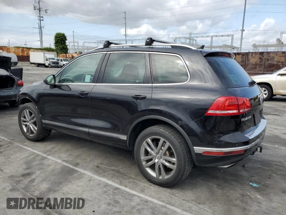 2016 Volkswagen Touareg Sport с VIN WVGEF9BP3GD011138, выставлен на аукционе Copart как лот 53557195 с пробегом 75 825 миль миль и Списание • Salvage title. История ставок и продаж доступна на DreamBid. Изображение 2.