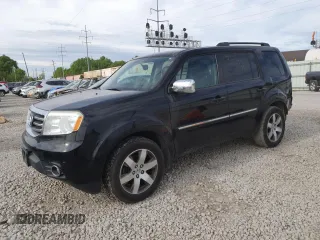 2014 Honda Pilot Touring z VIN 5FNYF4H93EB049472, wystawiony jako Copart lot #56130295 z przebiegiem 125 907 mil mil oraz Szkody całkowita. Historia ofert i sprzedaży dostępna na DreamBid. Obrazek 1.