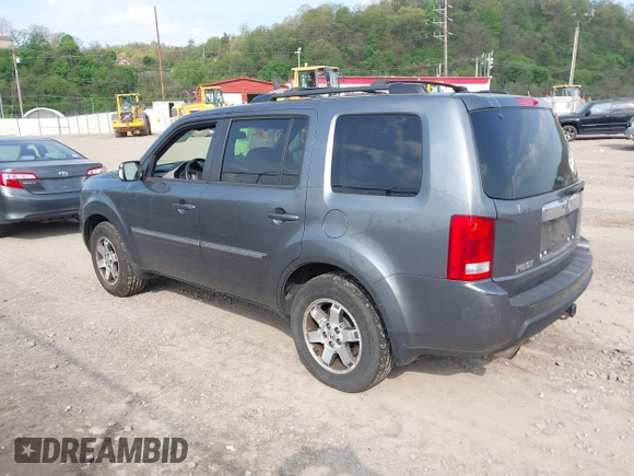 2011 Honda Pilot Touring with VIN 5FNYF4H90BB103824, listed as a IAAI auction lot 42127137 with 243,858 mi miles and . Bid and sale history available at carsss.com. Image 3.