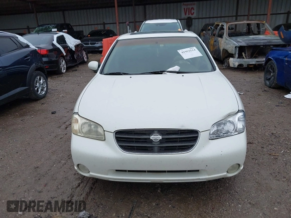 2000 Nissan Maxima GXE z VIN JN1CA31A4YT206065, wystawiony jako IAAI lot #41952514 z przebiegiem 2 953 347 mil mil oraz . Historia ofert i sprzedaży dostępna na DreamBid. Obrazek 14.
