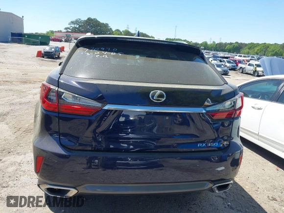 2016 Lexus RX 350 with VIN 2T2ZZMCA7GC004051, listed as a IAAI auction lot 42041491 with 149,515 mi miles and . Bid and sale history available at DreamBid. Image 16.