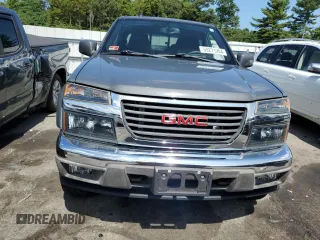 2012 GMC Canyon SLE2 with VIN 1GTH6PFE5C8138412, listed as a Copart auction lot 69271264 with 89,100 mi miles and Salvage Title. Bid and sale history available at carsss.com. Image 5.