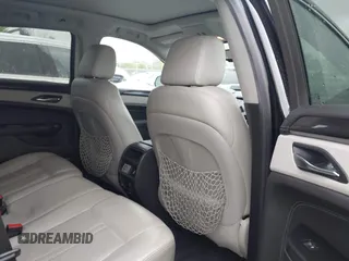 2016 Cadillac SRX Performance Collection with VIN 3GYFNCE31GS578010, listed as a IAAI auction lot 42346383 with 89,118 mi miles and . Bid and sale history available at DreamBid. Image 8.