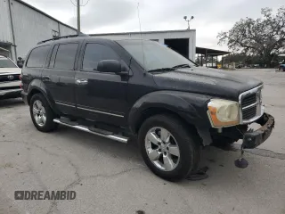 2004 Dodge Durango Limited with VIN 1D4HD58D34F230052, listed as a Copart auction lot 83030794 with 248,279 mi miles and Salvage title. Bid and sale history available at DreamBid. Image 4.