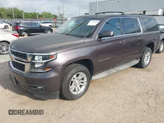 2015 Chevrolet Suburban LT with VIN 1GNSCJKCXFR175154, listed as a IAAI auction lot 42280418 with 227,373 mi miles and . Bid and sale history available at DreamBid. Image 21.