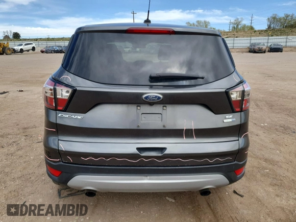 2017 Ford Escape SE with VIN 1FMCU9GD6HUE72847, listed as a Copart auction lot 53443735 with 106,462 mi miles and Salvage Title. Bid and sale history available at carsss.com. Image 6.