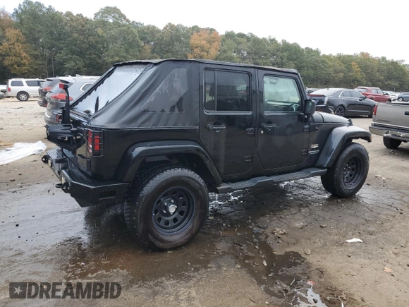 2008 Jeep Wrangler Unlimited Sahara with VIN 1J4GA59148L574934, listed as a Copart auction lot 74590164 with 134,674 mi miles and Salvage title. Bid and sale history available at DreamBid. Image 3.