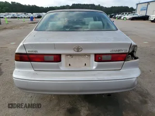1997 Toyota Camry LE z VIN 4T1BG22K6VU815524, wystawiony jako Copart lot #57466415 z przebiegiem Nie podano mil oraz Szkoda całkowita • Salvage title. Historia ofert i sprzedaży dostępna na DreamBid. Obrazek 6.