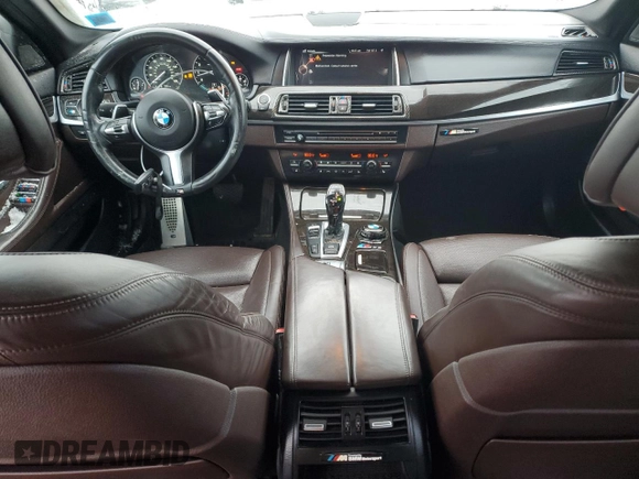 2015 BMW 5 Series 550i with VIN WBAKN9C55FD960970, listed as a Copart auction lot 84994434 with 105,593 mi miles and Salvage title. Bid and sale history available at DreamBid. Image 8.