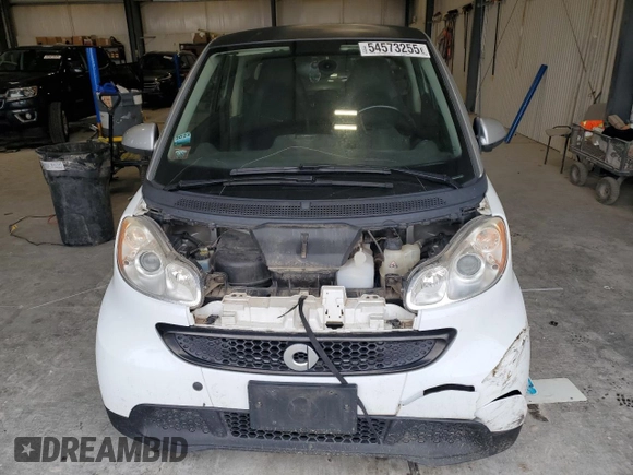 2013 Smart fortwo Pure с VIN WMEEJ3BA9DK626037, выставлен на аукционе Copart как лот 54573255 с пробегом 66 070 миль миль и Чистый • Clean title. История ставок и продаж доступна на DreamBid. Изображение 5.