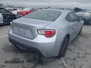 2016 Scion FR-S with VIN JF1ZNAA11G8702268, listed as a IAAI auction lot 41897845 with 133,750 mi miles. Bid and sale history available at carsss.com. Image 4.