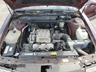 1992 Oldsmobile 88 z VIN 1G3HN53L6N1805364, wystawiony jako Copart lot #71710934 z przebiegiem 47 032 mil mil oraz Szkoda całkowita • Salvage title. Historia ofert i sprzedaży dostępna na DreamBid. Obrazek 11.