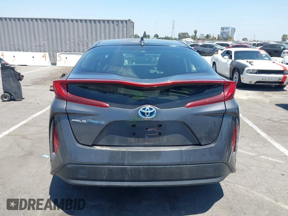 2021 Toyota Prius LE with VIN JTDKAMFPXM3170372, listed as a IAAI auction lot 42661609 with 47,977 mi miles and . Bid and sale history available at DreamBid. Image 16.