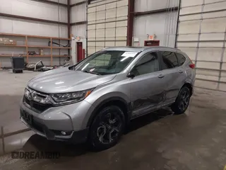 2017 Honda CR-V Touring with VIN 2HKRW2H90HH603307, listed as a IAAI auction lot 41868564 with 81,144 mi miles. Bid and sale history available at carsss.com. Image 19.