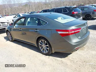 2014 Toyota Avalon Limited z VIN 4T1BK1EB0EU118032, wystawiony jako IAAI lot #41864586 z przebiegiem 72 477 mil mil oraz . Historia ofert i sprzedaży dostępna na DreamBid. Obrazek 3.