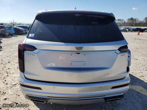 2020 Cadillac XT6 FWD Premium Luxury with VIN 1GYKPERSXLZ218589, listed as a Copart auction lot 46632615 with 57,876 mi miles and Clean Title. Bid and sale history available at carsss.com. Image 6.