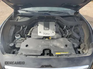 2015 Infiniti QX70 with VIN JN8CS1MW0FM482289, listed as a Copart auction lot 56597955 with 123,227 mi miles and Salvage title. Bid and sale history available at DreamBid. Image 12.