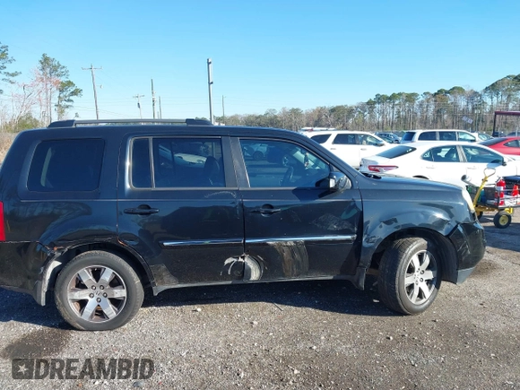 2013 Honda Pilot Touring with VIN 5FNYF4H9XDB047796, listed as a IAAI auction lot 41591189 with 188,579 mi miles and . Bid and sale history available at carsss.com. Image 12.