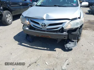 2012 Toyota Corolla L with VIN 2T1BU4EEXCC818354, listed as a IAAI auction lot 42129695 with 216,307 mi miles. Bid and sale history available at carsss.com. Image 6.