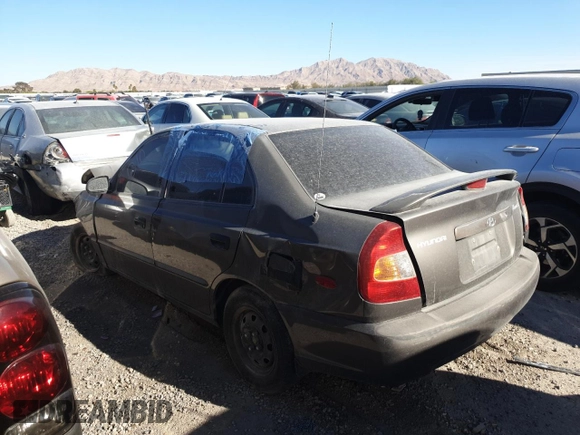 2002 Hyundai Accent GL with VIN KMHCG45C92U305295, listed as a Copart auction lot 43836105 with 92,435 mi miles and Non Repairable. Bid and sale history available at carsss.com. Image 2.