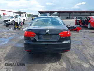 2013 Volkswagen Jetta SE z VIN 3VWDX7AJ4DM396477, wystawiony jako IAAI lot #42659959 z przebiegiem 115 833 mil mil oraz . Historia ofert i sprzedaży dostępna na DreamBid. Obrazek 16.
